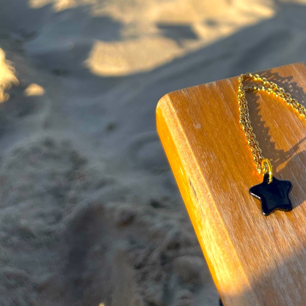 Handmade jewelry - necklace. New! Little black star charm. Gold plated.